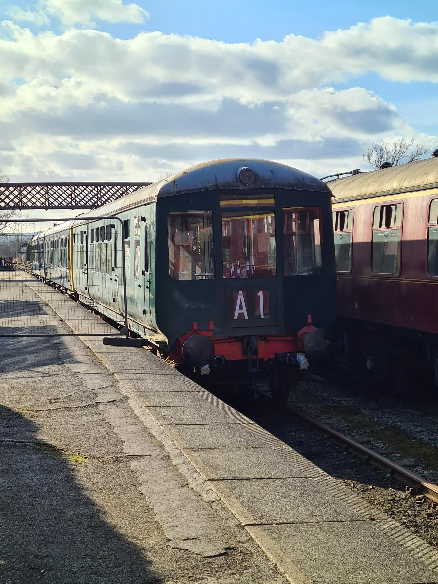 Class 100 in the platform at Butterley